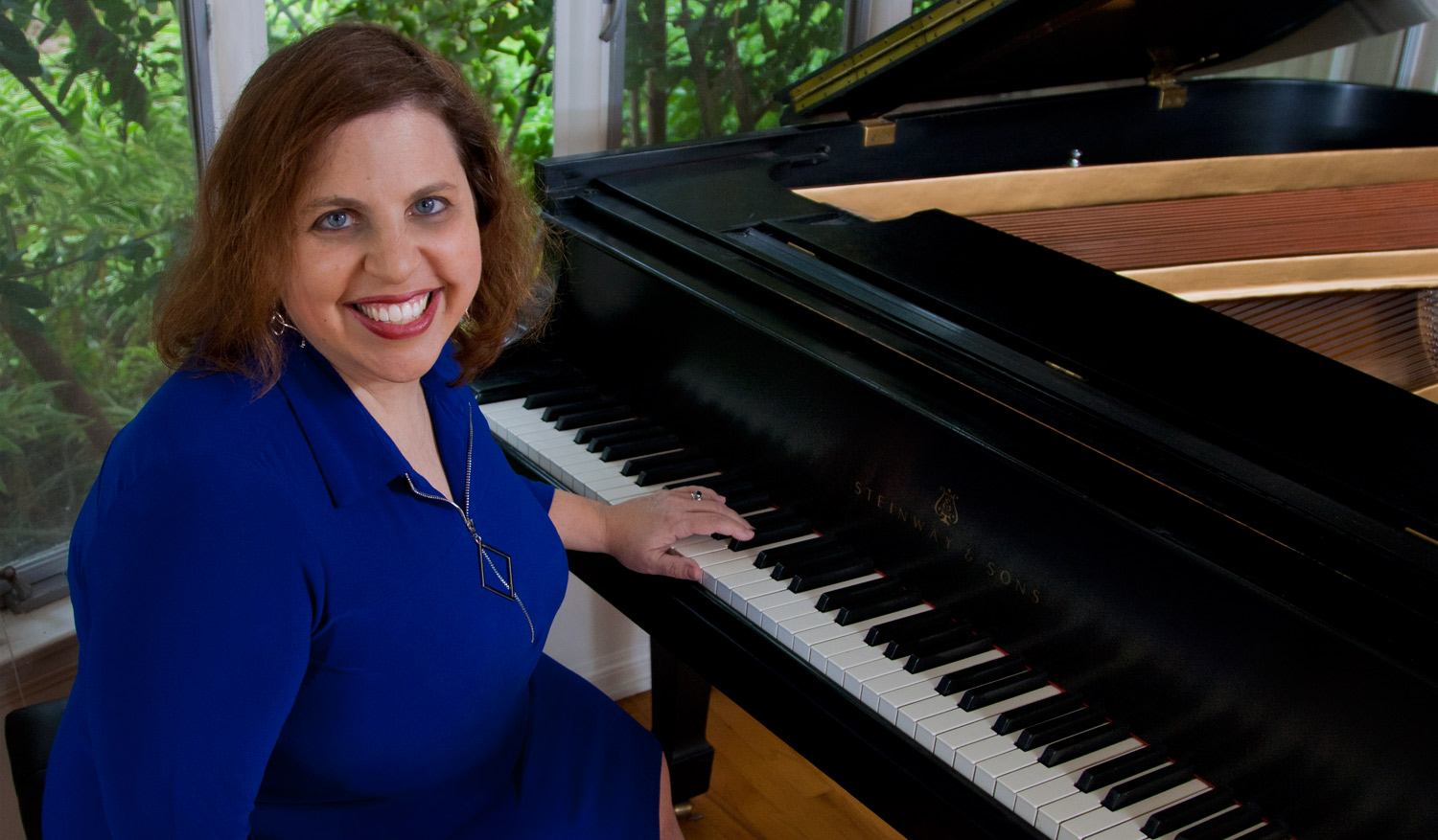 Margy at the piano.